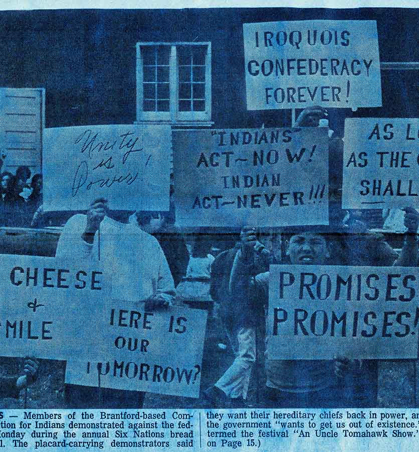 Close-up cut-out of a newspaper article infused with bluish tones. 
