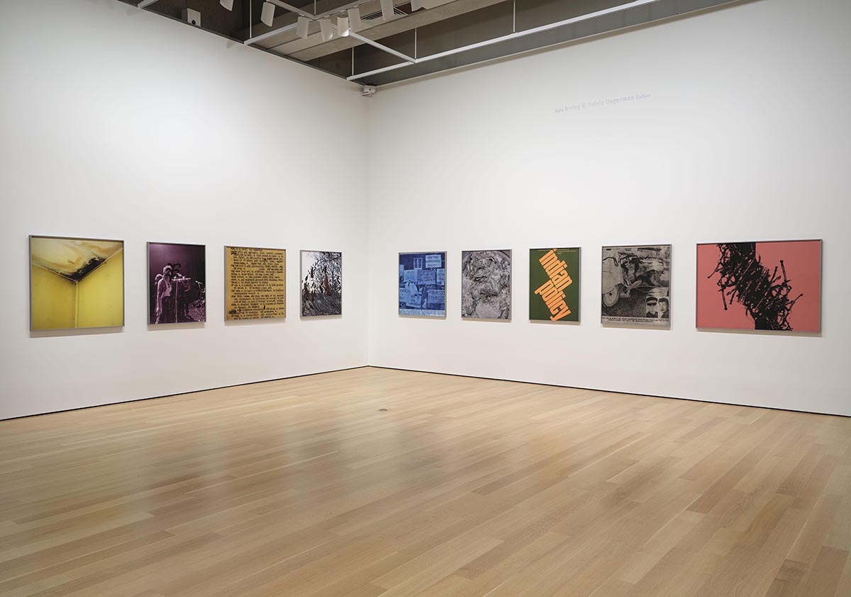 Nine works of art displayed on a white gallery wall.  