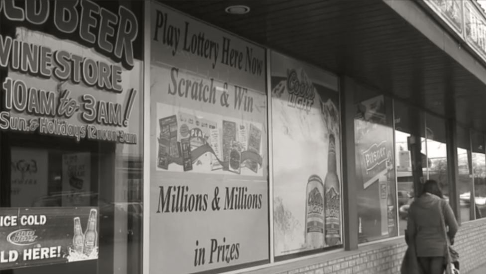Sepia photo of a storefront. 